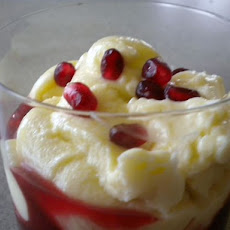 Rum Pudding with Pomegranate Raspberry Compote