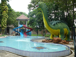 Dinosaur at Pool