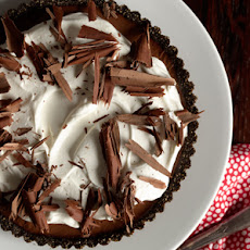 Triple Chocolate Tart with Boozy Whipped Cream