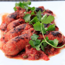 Grilled Mexican Chorizo with Spicy Tomato Caper Sauce