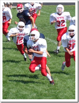 Zach's first game.  He has the ball