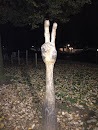 Peace sign carved tree