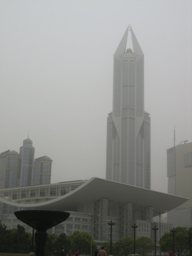 Shanghai Grand Theatre with Tomorrow Square behind it.