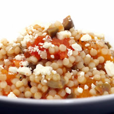 Baked Couscous with Tomatoes