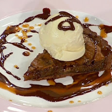 Warm Chocolate Praline Tart with Caramel, Chocolate Sauce, and Vanilla Ice Cream