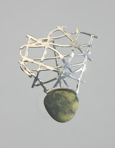 the beach rocks broach green web