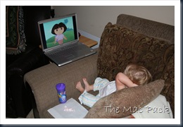 20080830 - Savannah Watching Dora on Laptop on Couch (3)