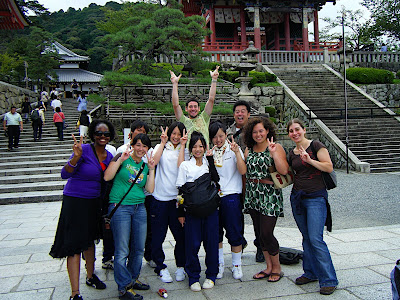 In Kyoto, High School kids wanted a picture with us.