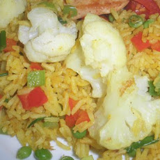 Curried Rice With Cauliflower and Peas