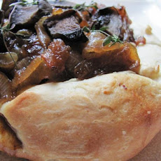 Pizza With Honey, Caramelized Onions, Cheese and Mushrooms