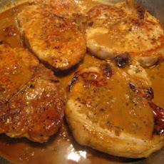 Pork Chops with Flaming Apricot Bourbon Sauce