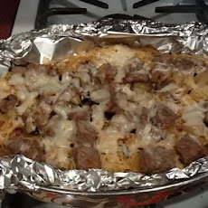 Spaghetti With a Brown Sauce Baked in Foil