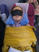 Gokul lila sleeping on the plane :-)
