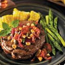 Rib Eye Steak With a Roasted Tomato, Peanut and Jalapeno Relish