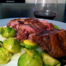 Duck Breast with Kohlrabi Mash, Butter Braised Brussels Sprouts, & Vino Drizzle