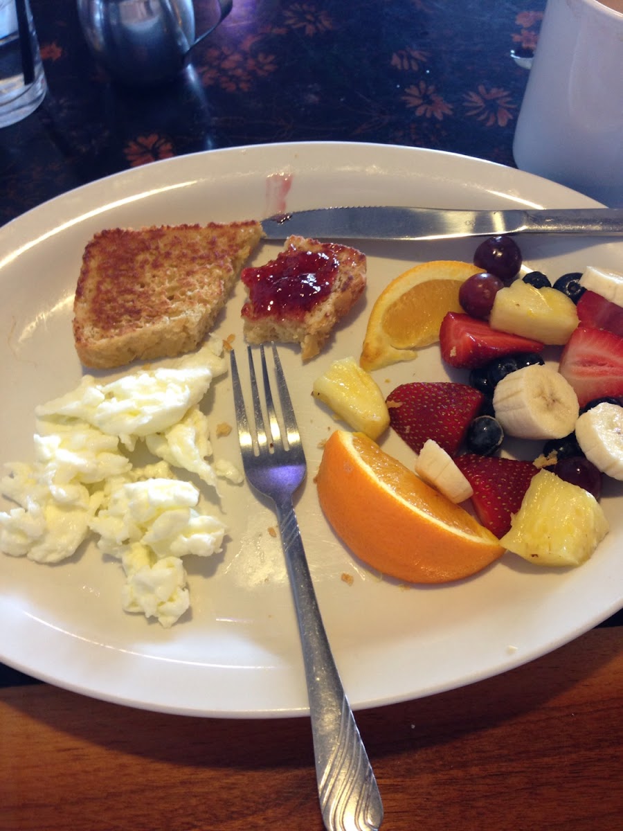 Healthy breakfast of egg whites, fruit and gluten free homemade bread. You must try this place, deli