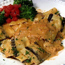 Black and White Lobster Ravioli in a Seafood Cream Sauce