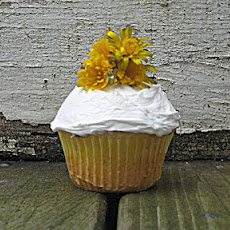 Lemon Poppy Seed Cupcakes Topped With Lemon Buttercream Frosting