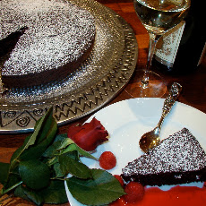 Decadent Flourless Chocolate Cake with Raspberry Coulis