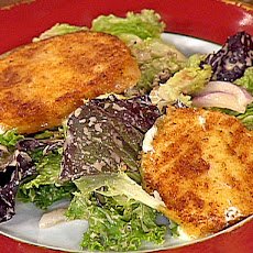 Delmonico Baby Greens with Fried Mozzarella, Tomatoes, Red Onions, and Balsamic Vinaigrette