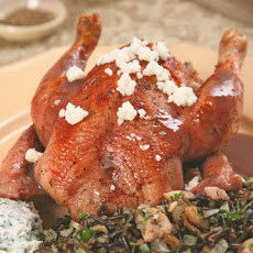 Pomegranate-Glazed Cornish Game Hens with Wild Rice-Chestnut Stuffing and Yogurt Sauce