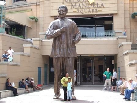 The Statue of Nelson Mandela at Nelson Mandea Square The Statue of Nelson Mandela at Nelson Mandea Square