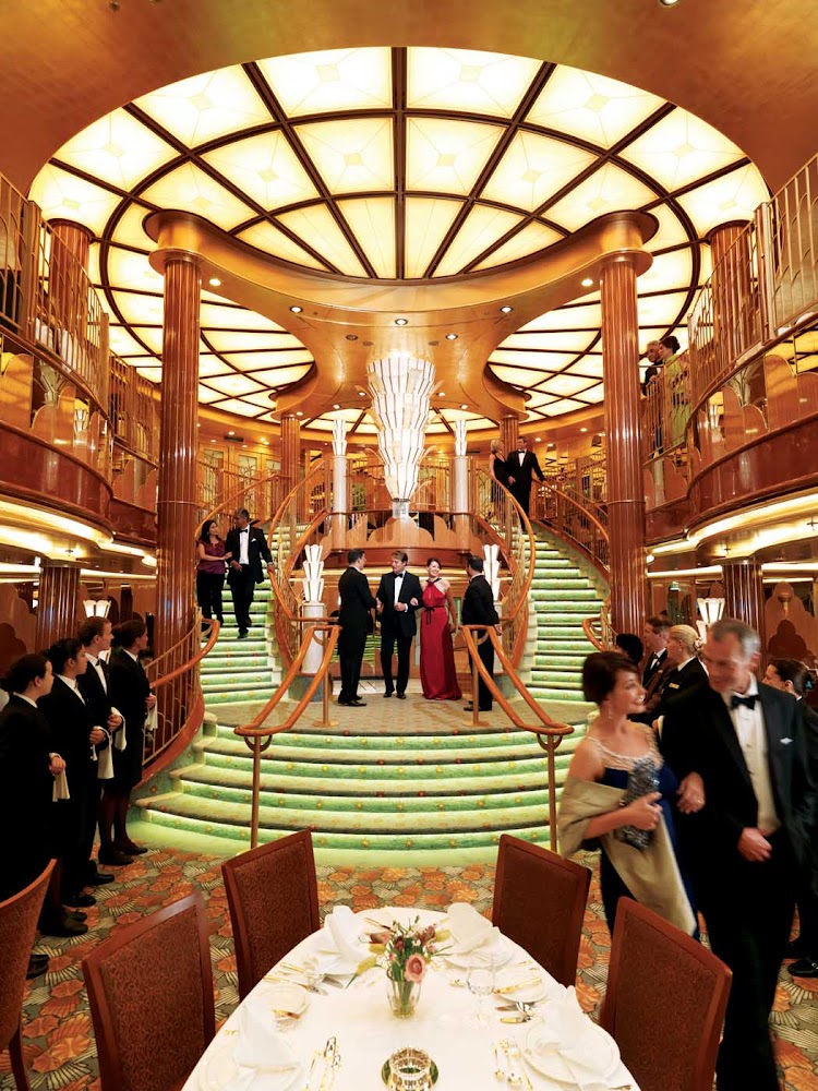 Dine at the Britannia Restaurant aboard Queen Elizabeth — pomp and circumstance included.