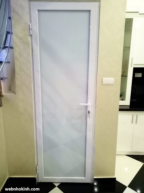 Cửa đi thông phòng nhôm Việt Pháp hệ 450 không chia đố màu trắng sứ, kính trắng sữa Cửa đi thông phòng nhôm Việt Pháp hệ 450 không chia đố màu trắng sứ, kính trắng sữa