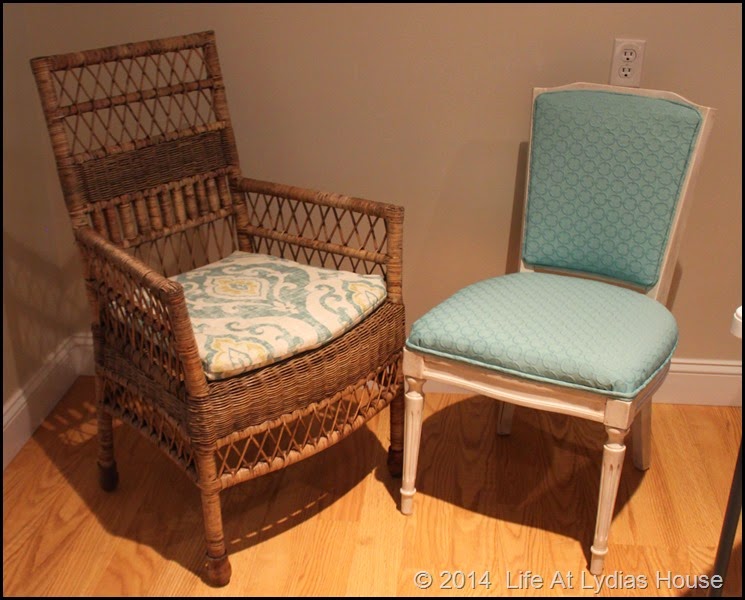 wicker chair w upholstered chair