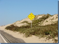 6665 Texas, South Padre Island - Watch For Sand Drifts On Pavement sign