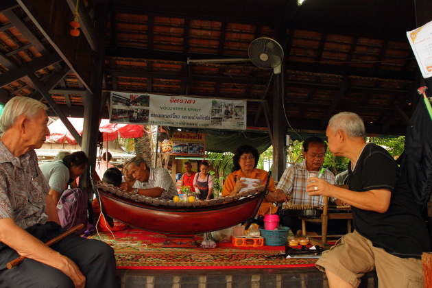 Traditional Music being appreciated by Thai people at Taling Chan Floating Market