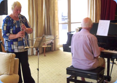 Colleen and John Perkin dueting for the members and residents. Colleen on her Clarinet and John accompanying on grand piano.