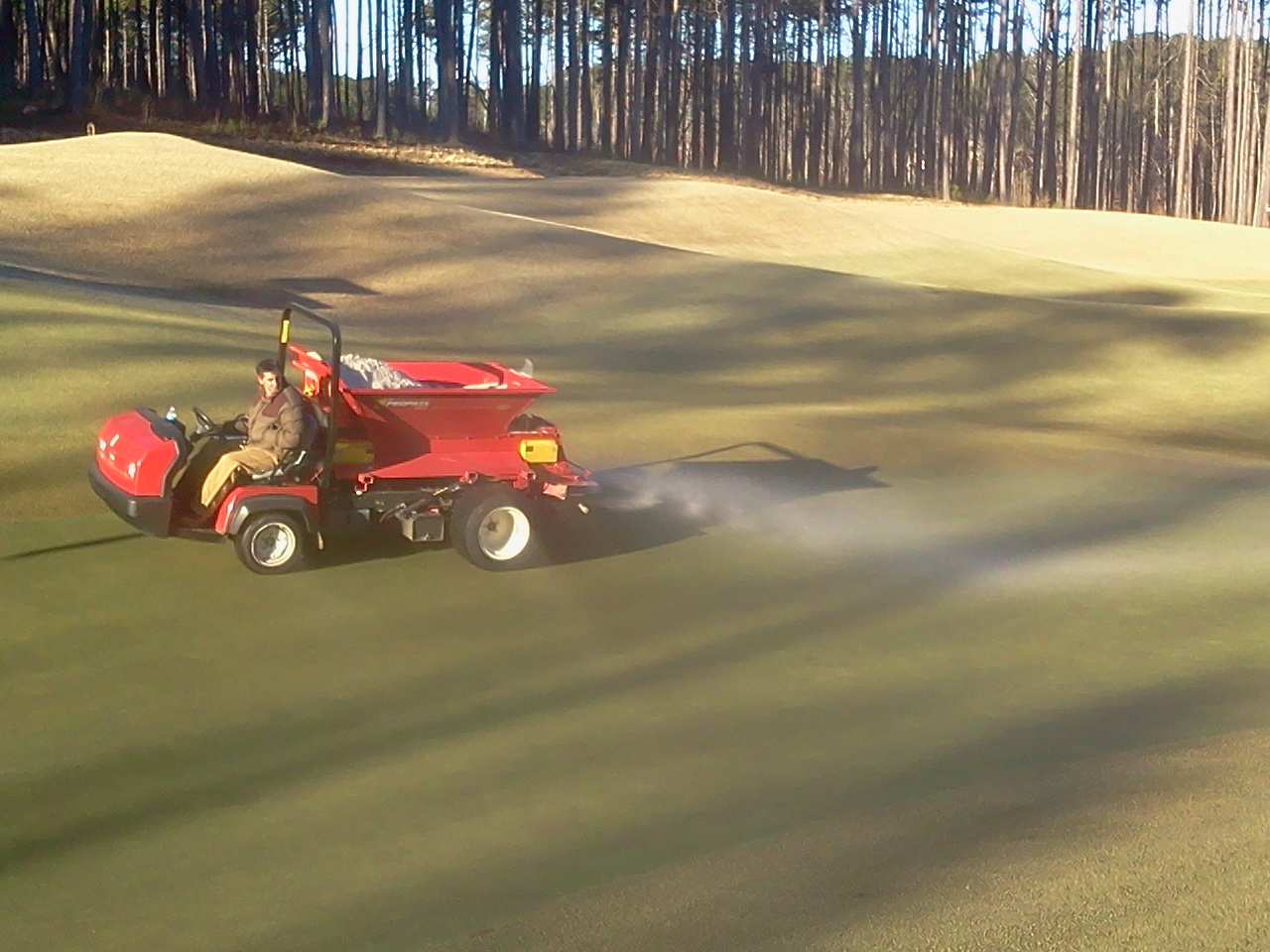 The Creek Club Golf Course Maintenance Topdressing greens