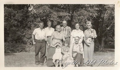 Group with dog one DL Antiques