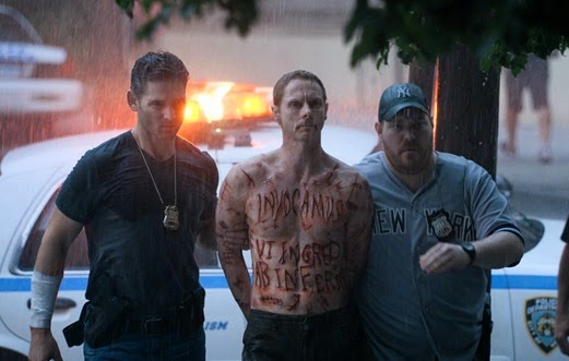 Sarchie (Eric Bana) brings in Santino (Sean Harris) with other officers in Screen Gems' DELIVER US FROM EVIL.