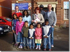 COPY Rob White (left), Priya, Beata, John Josh Williams (right) and children outside Arthur Hill