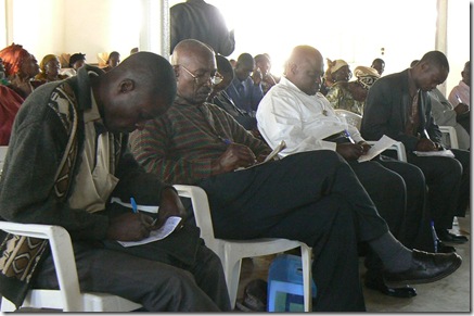 Delegates, taking notes