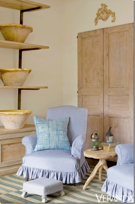 In Jane Moore's family room, a pair of old doors from Chateau Domingue. Photo by Peter Vitale. Veranda, March 2012. Found on Hello Lovely Studio.