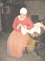 Plimoth Plant pilgrim lady sewing