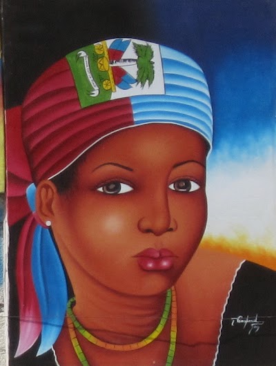 Haitian painting along side the streets of Port au Prince, Haiti.