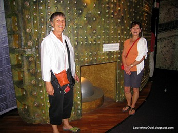 Becky and Pat next to a mockup of the Miraflores lock gate.