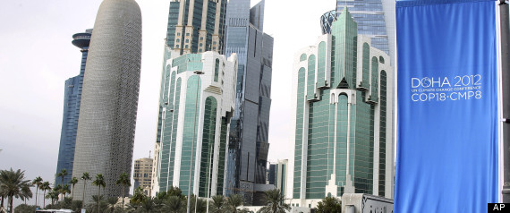 In this 20 November 2012 file photo, conference flags are displayed ahead of the Doha Climate Change Conference, in Doha, Qatar. AP