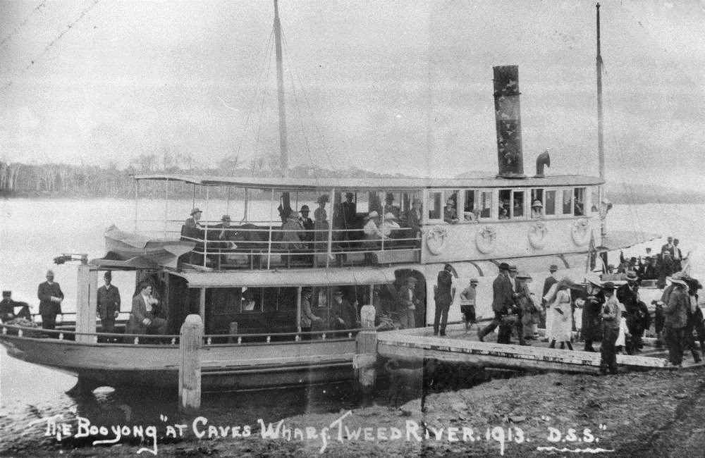 [StateLibQld_1_298611_Unloading_passengers_off_the_steamboat_Booyong_at_Caves_Wharf_on_the_Tweed_River%252C_1913%255B2%255D.jpg]