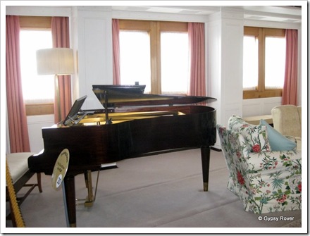The baby grand piano in the family room which many members of the royal family played.