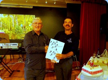 Club President, Gordon Sutherland, congratulating Acting Secretary, Peter Littlejohn, on his Birthday. All the members present were pleased to sign the Birthday Card. Photo courtesy of Colleen Kerr.