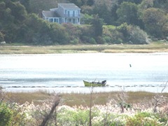 11.2011 fisherman in boat at fort hill