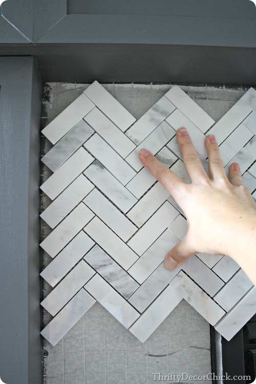 marble herringbone tile