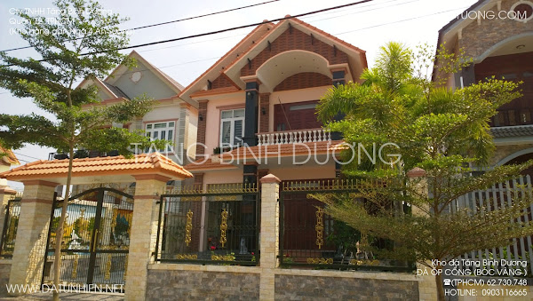Cổng nhà ốp đá cong nha op da