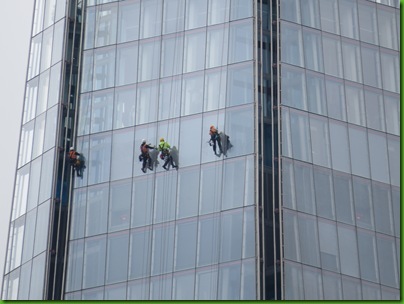 050  Closeup of window cleaners on the 'Shard', 300 ft above ground