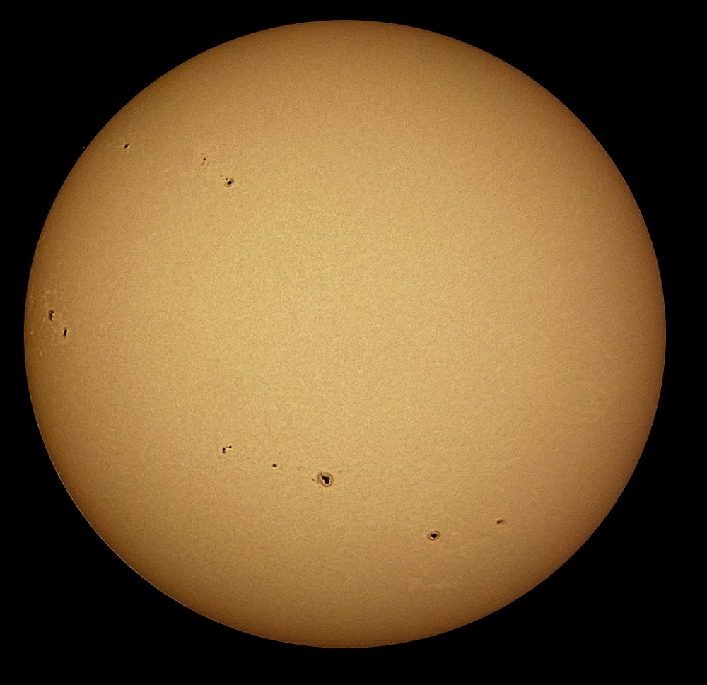  Sun + sunspots through a 10 inch telescope…with a cell phone camera